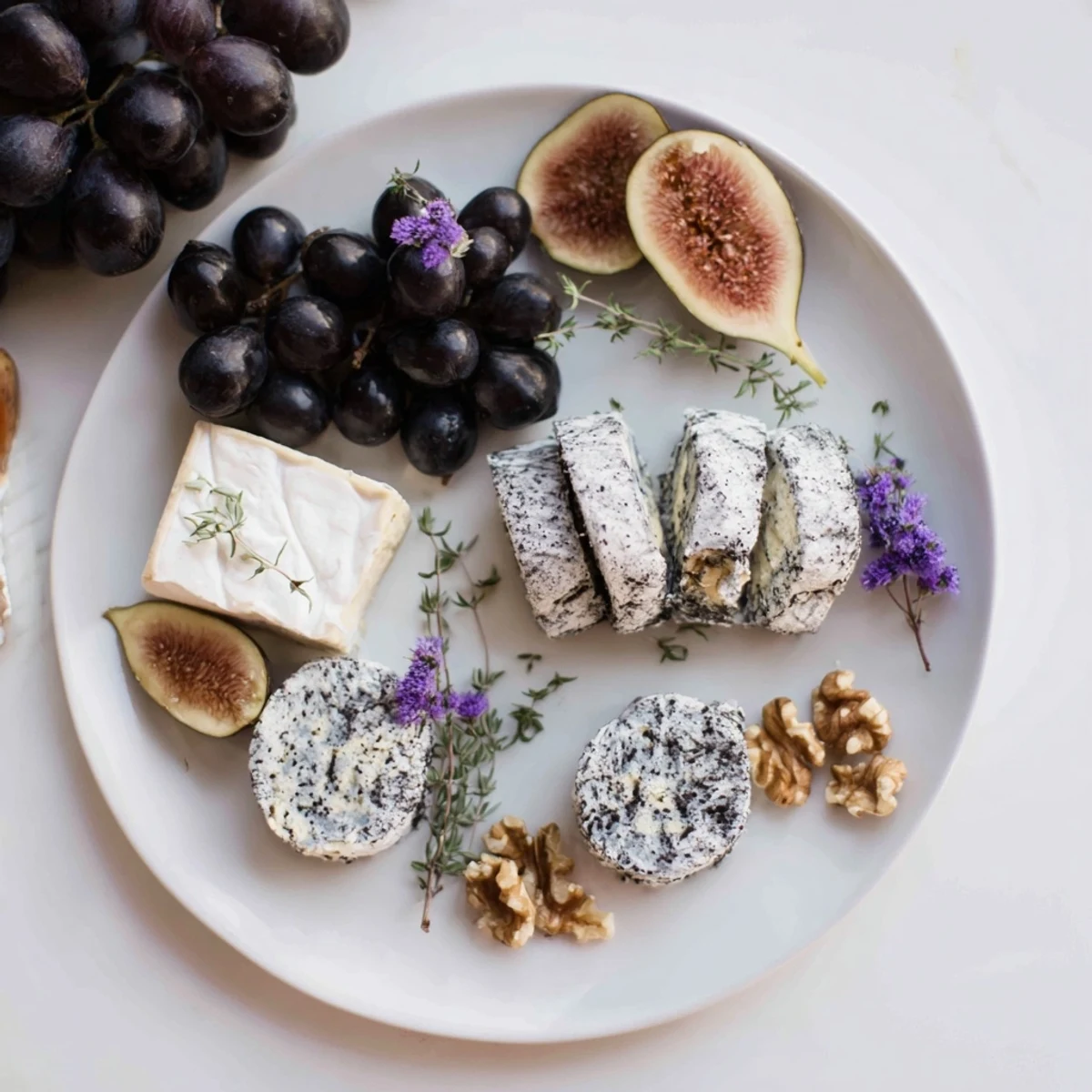 The Lavender Haze cheese board features creamy goat cheese, brie, and lavender honey, ready to serve.