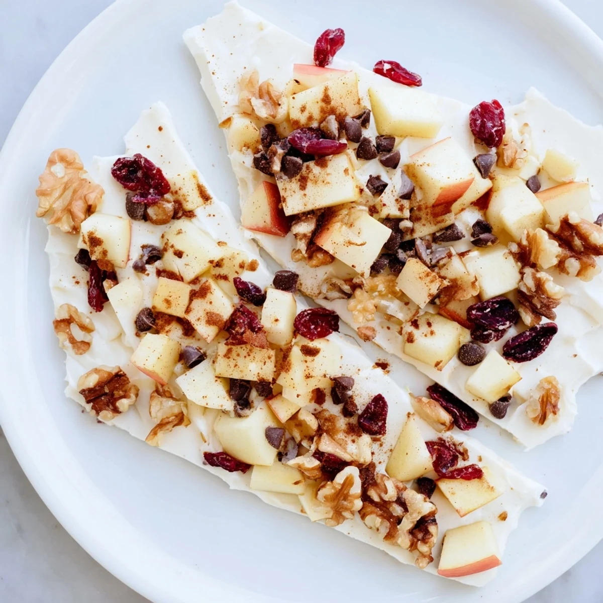 Cool, creamy Apple Cinnamon Yogurt Bark, showing a perfect combination of healthy ingredients and sweet flavors.