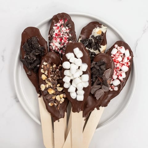 A Hot Chocolate Spoon Toppings Board, a visual feast of chocolate spoons and sweet toppings.