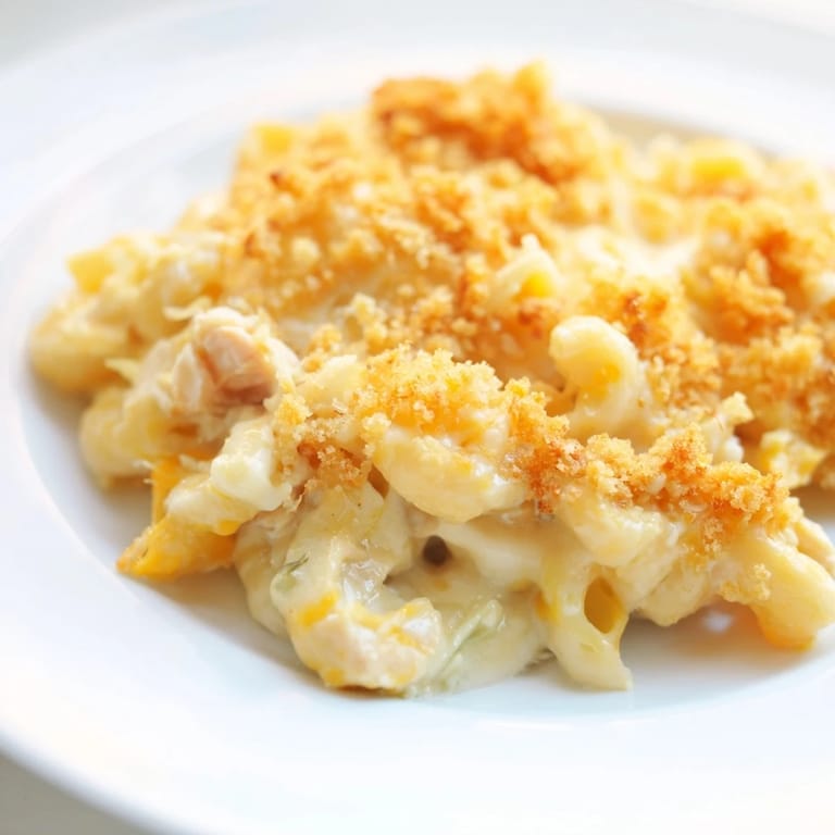 Golden-topped Struggle Meal Chicken Macaroni, ready to be served, is perfect for a quick dinner.